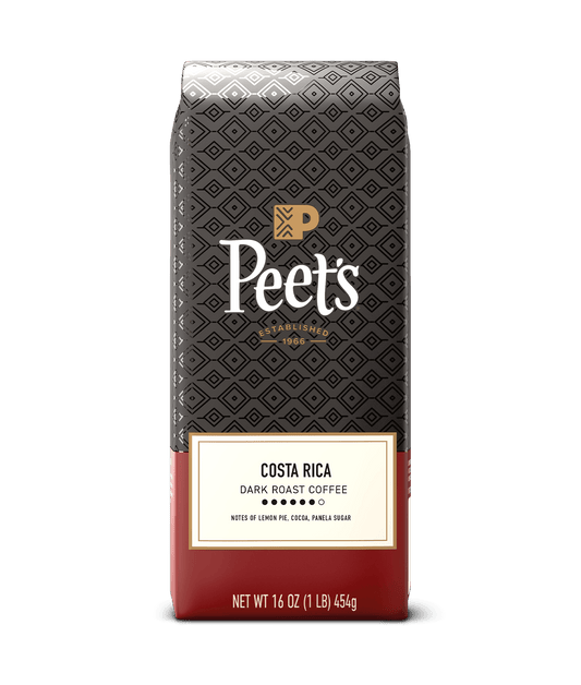 Peet's Costa Rica dark roast coffee package on a green background