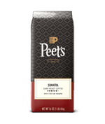 Peet's Sumatra dark roast coffee package on a green background