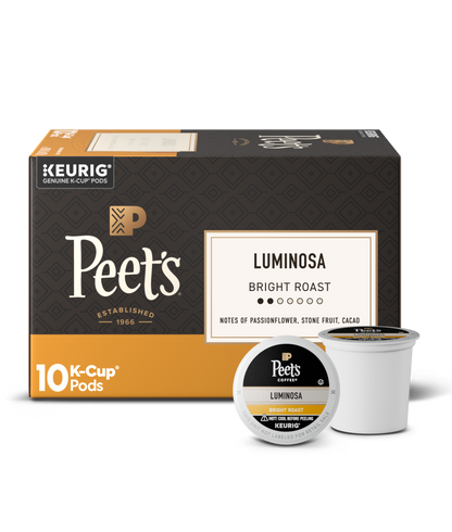 Box of Peet's Luminosa K-Cup pods with a single pod on a white background